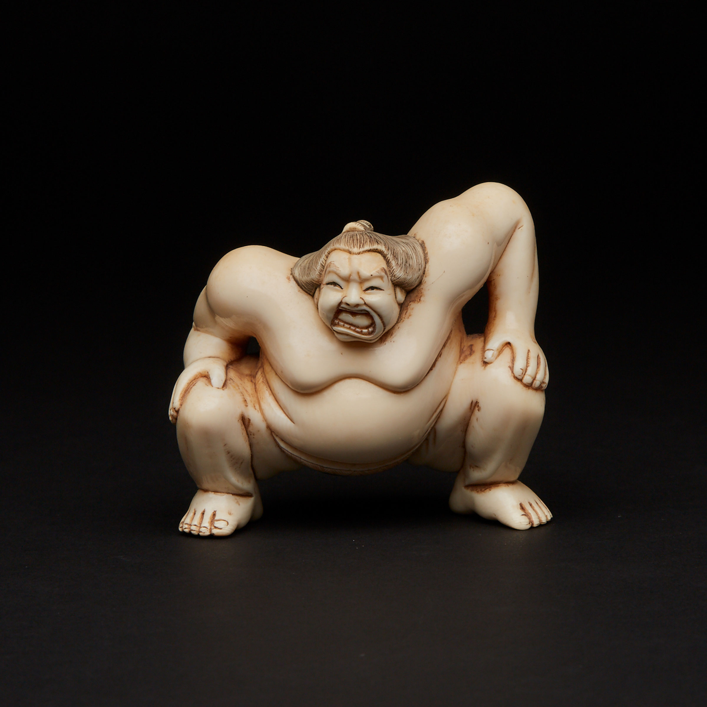 A Large Ivory Okimono of a Sumo Wrestler