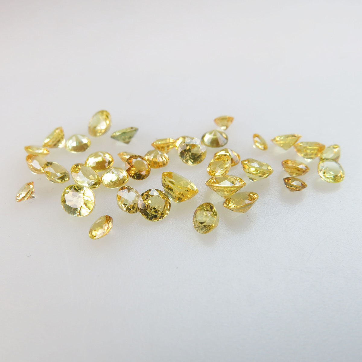 37 Small Round And Oval Cut Yellow Sapphires