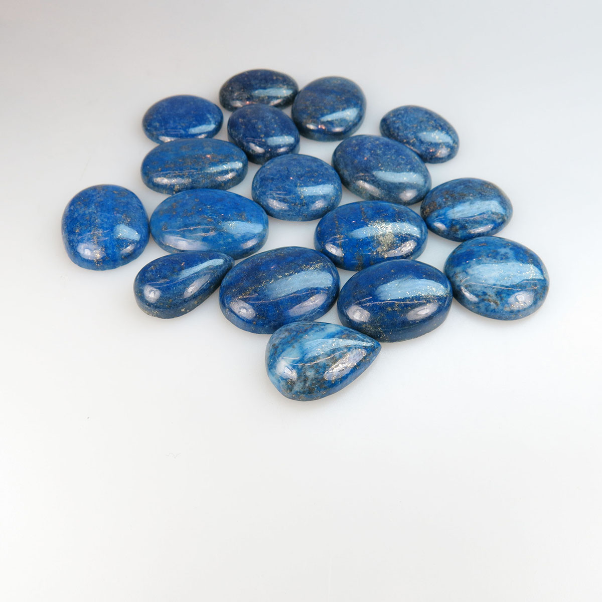 17 Oval and Pear Shaped Lapis Lazuli Cabochons