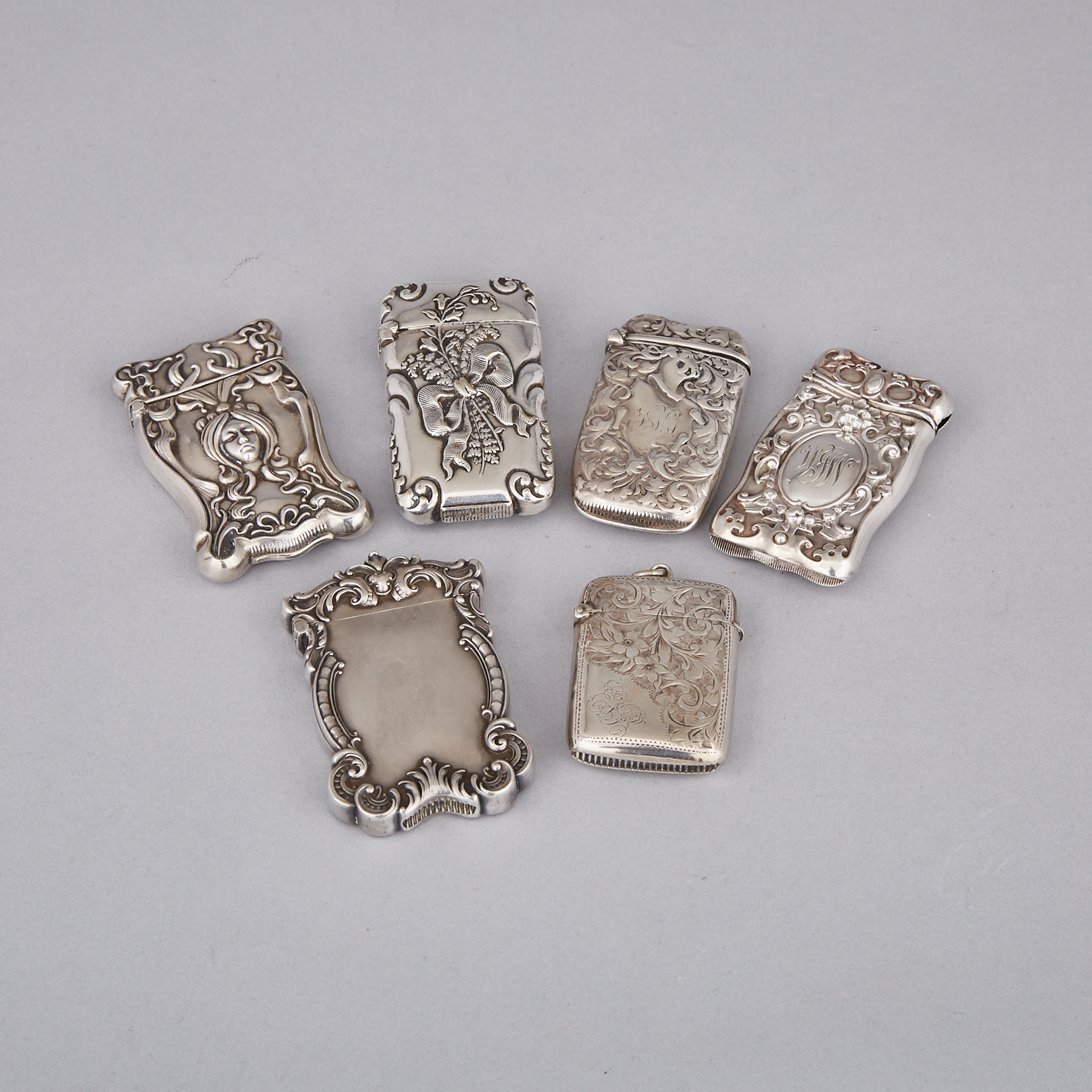 One English and Five American Silver and Silver Plated Vesta Cases, late 19th/early 20th century
