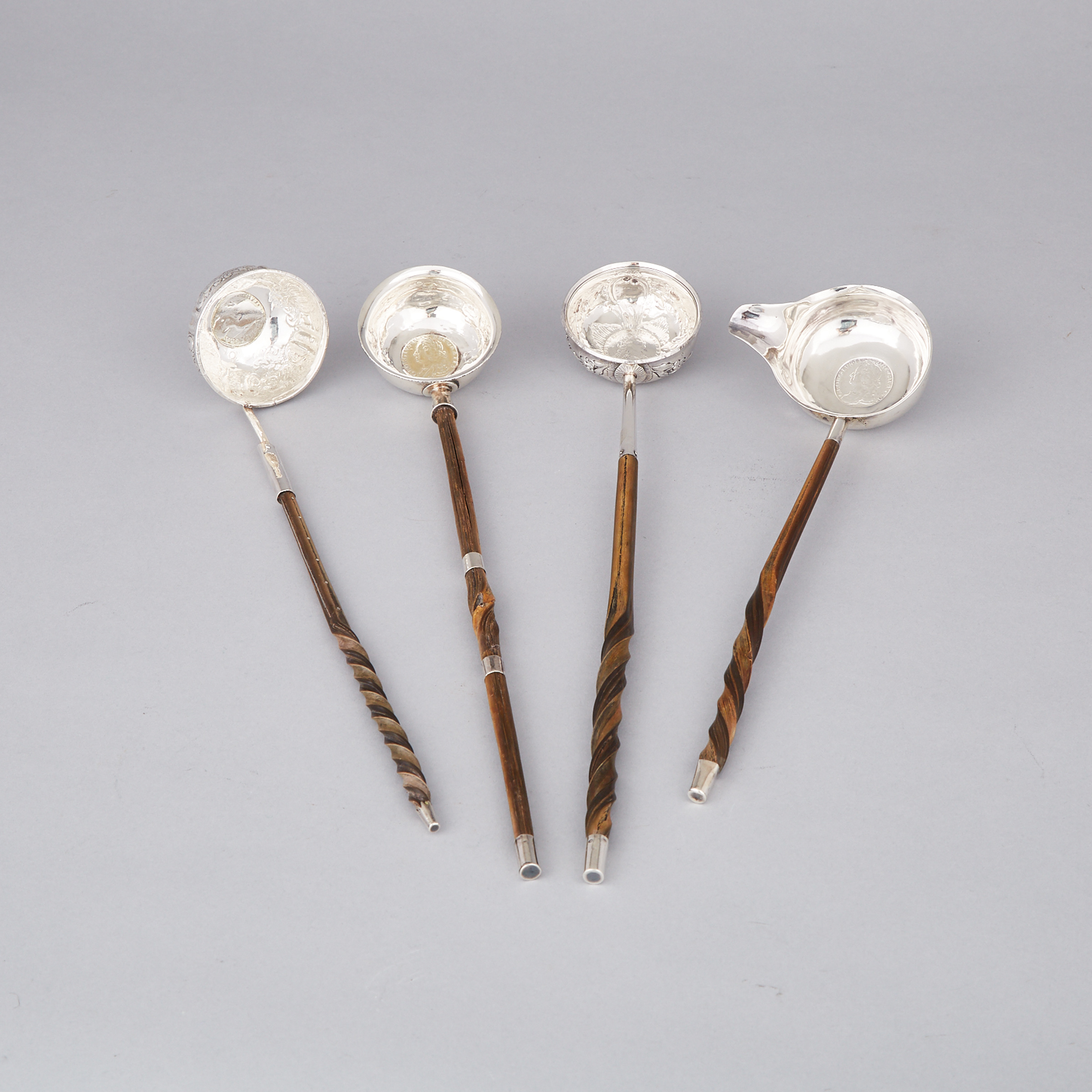 Four Georgian Silver Toddy Ladles, c.1800 