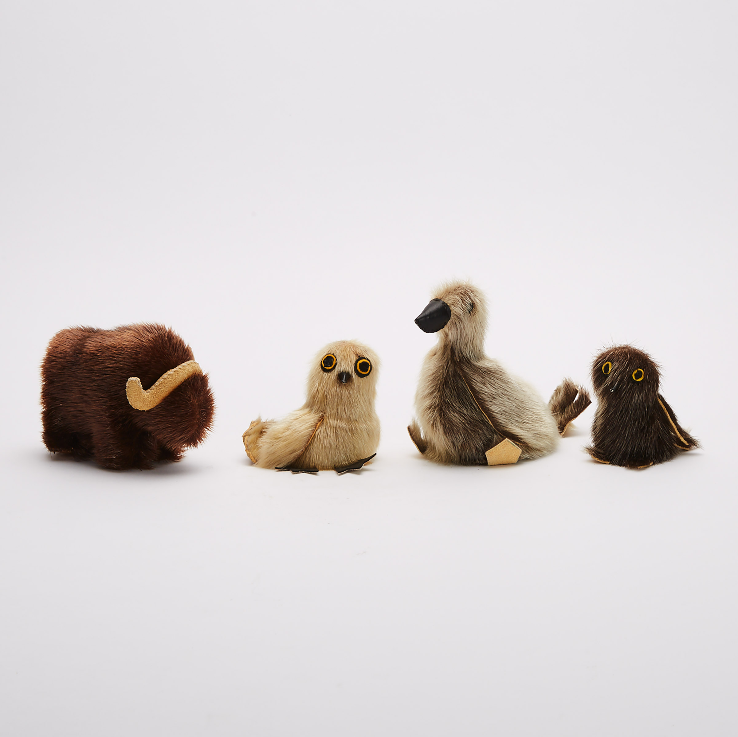 GROUP OF FOUR SEAL SKIN ANIMAL SOUVENIRS