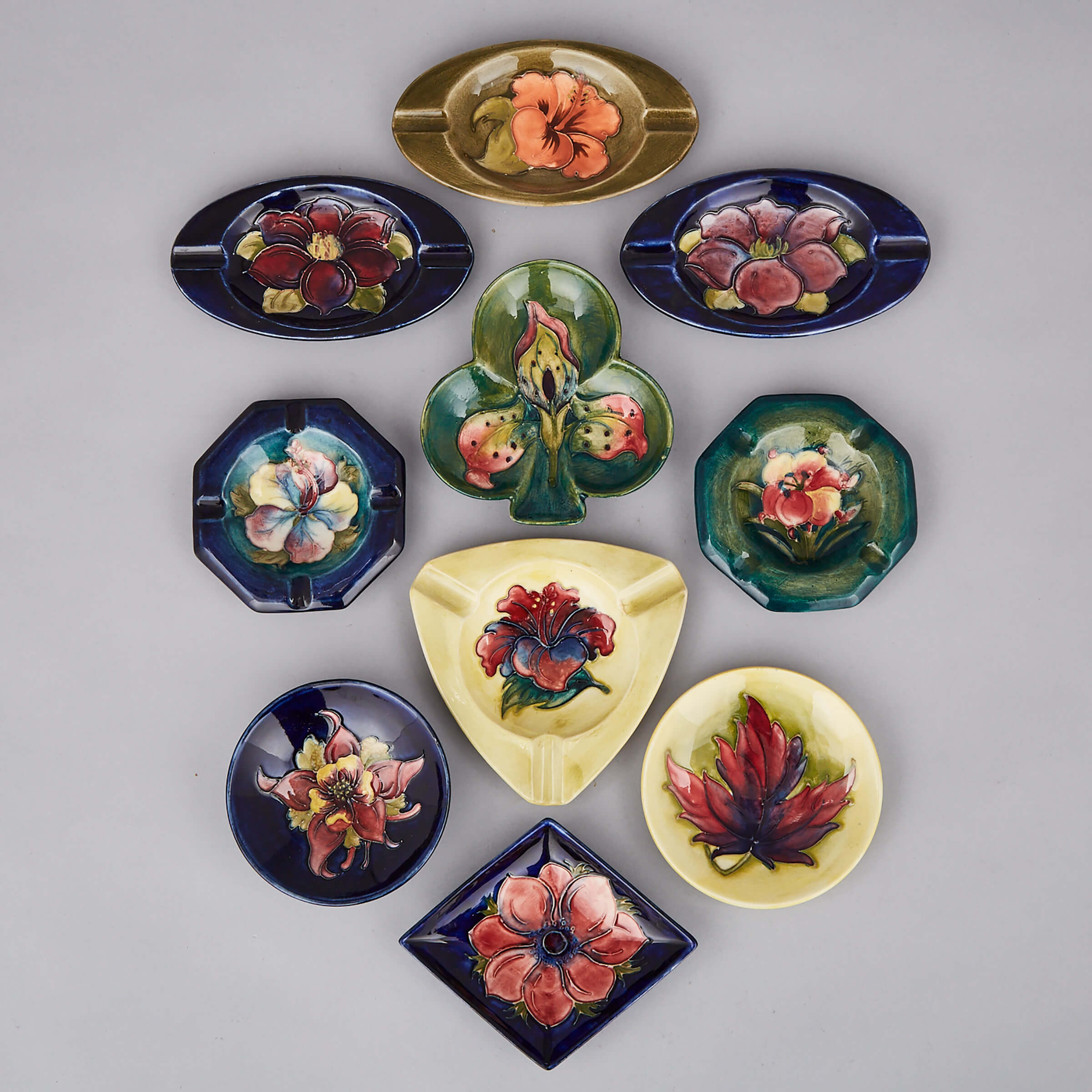 Seven Moorcroft Ashtrays and Three Small Dishes, 20th century