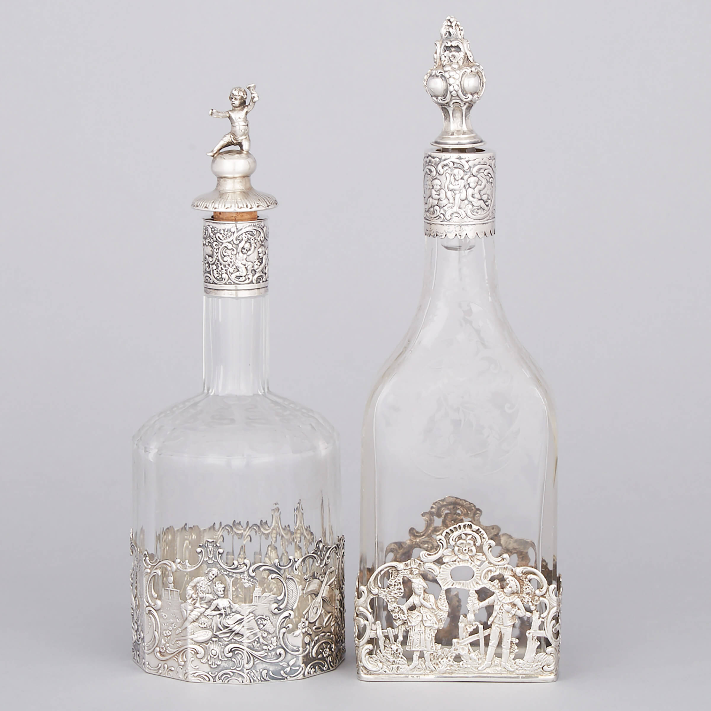 Two German Silver Mounted Etched Glass Decanters, Weinranck & Schmidt and J.D. Schleissner & Söhne, Hanau, c.1900