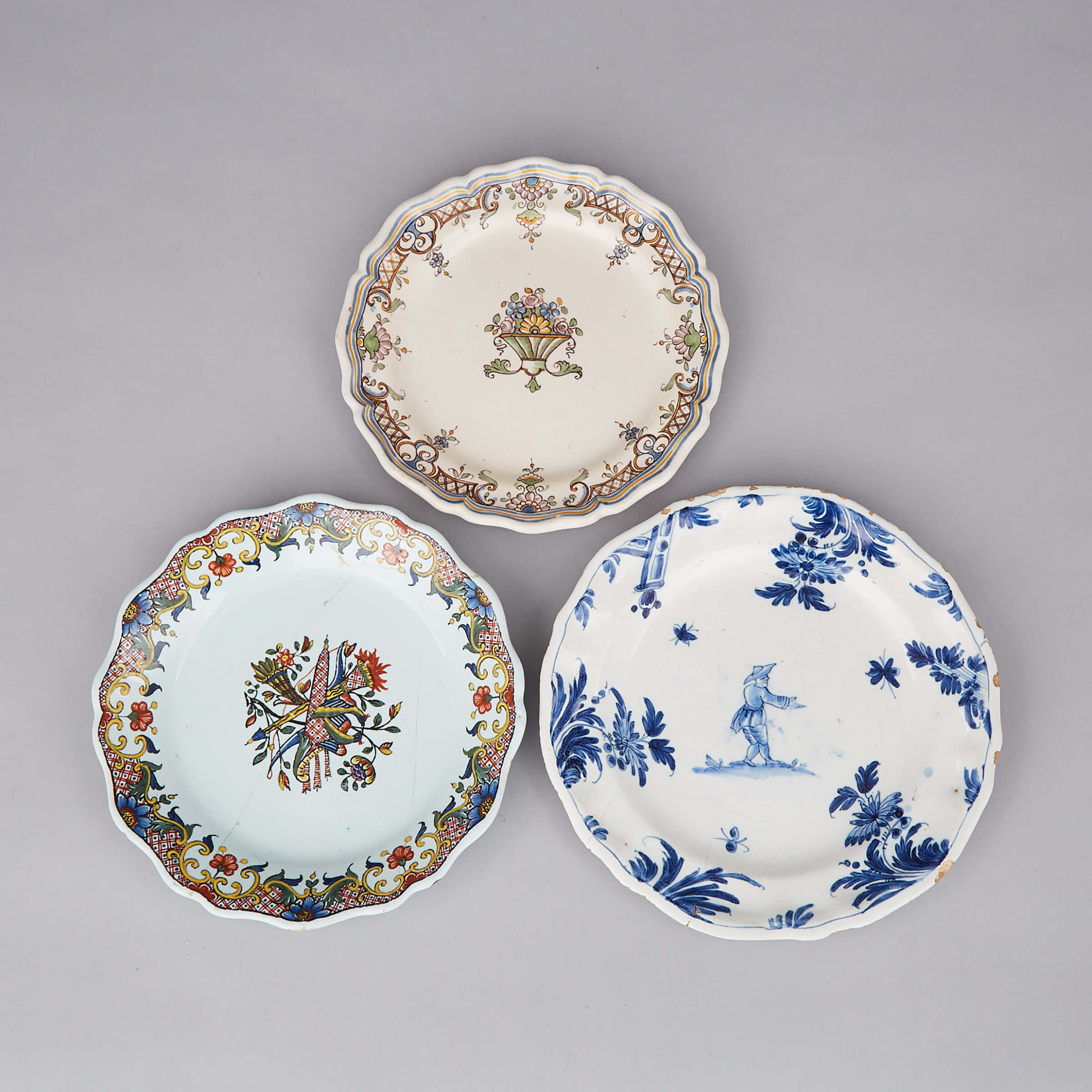 Two Bordeaux and Rouen Polychrome Decorated Faience Plates and a Blue Painted Chinoiserie Plate, Madeleine Héraud & Louis Leroy, 18th century