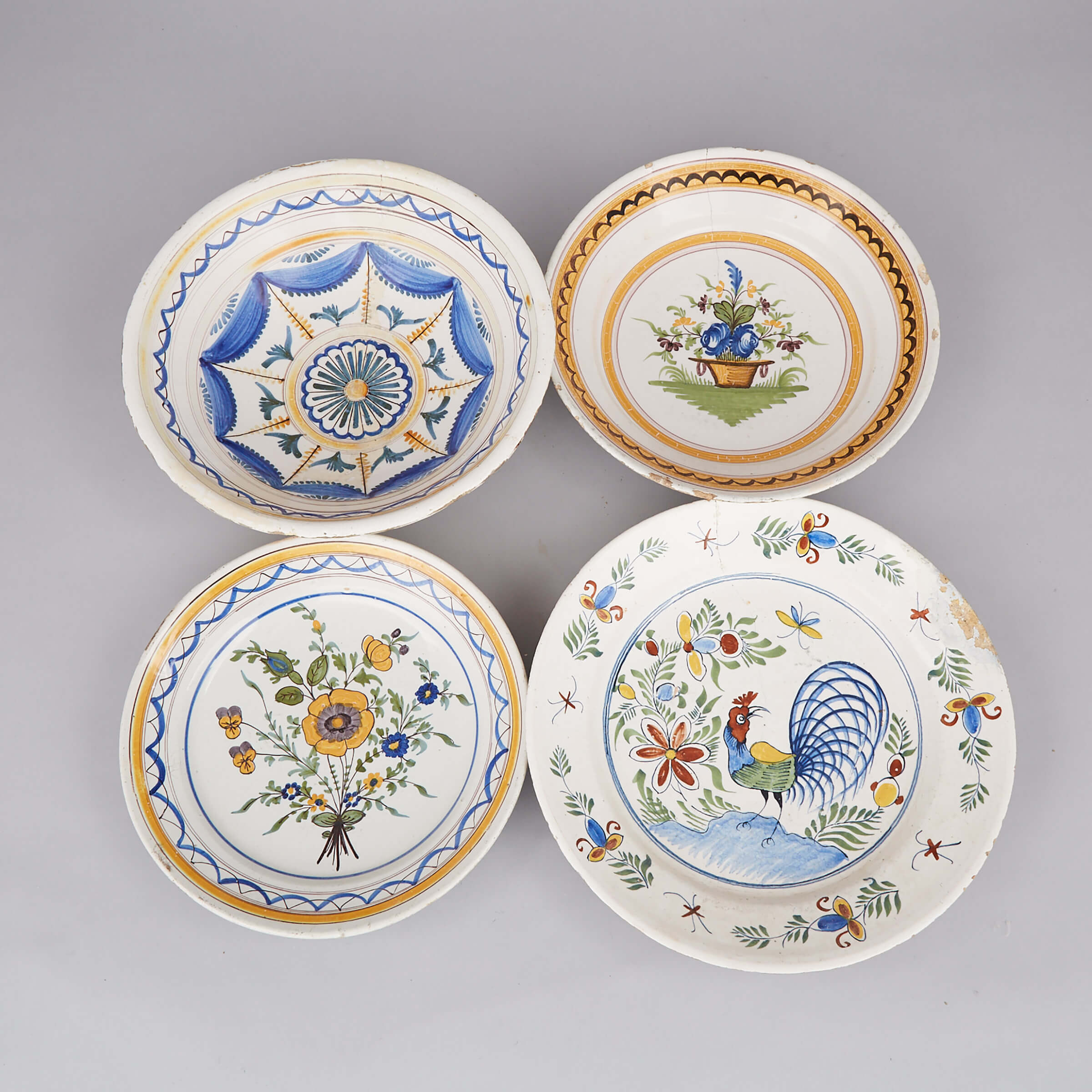 Two French Faience Polychrome  Painted Chargers and Two Bowls, 19th century