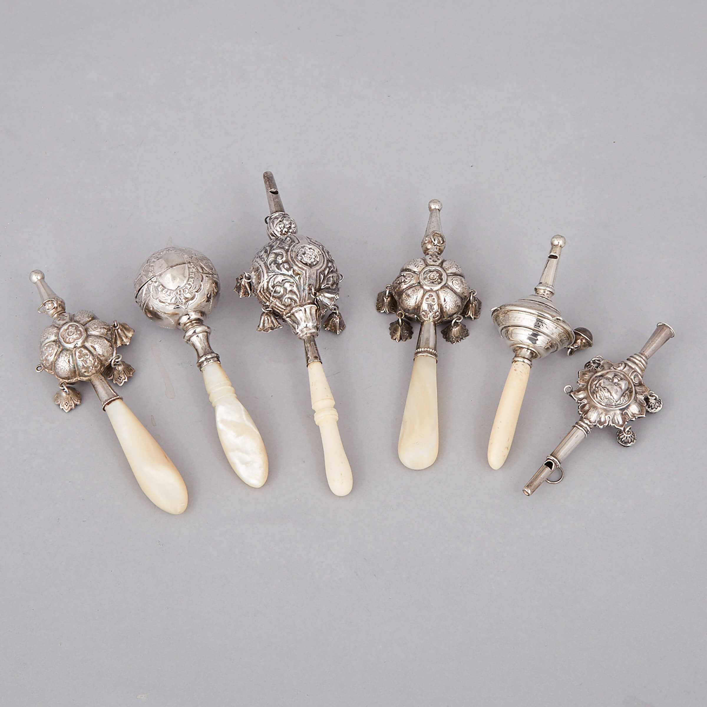 Six Continental Silver Child’s Rattles and Whistles, late 19th/20th century