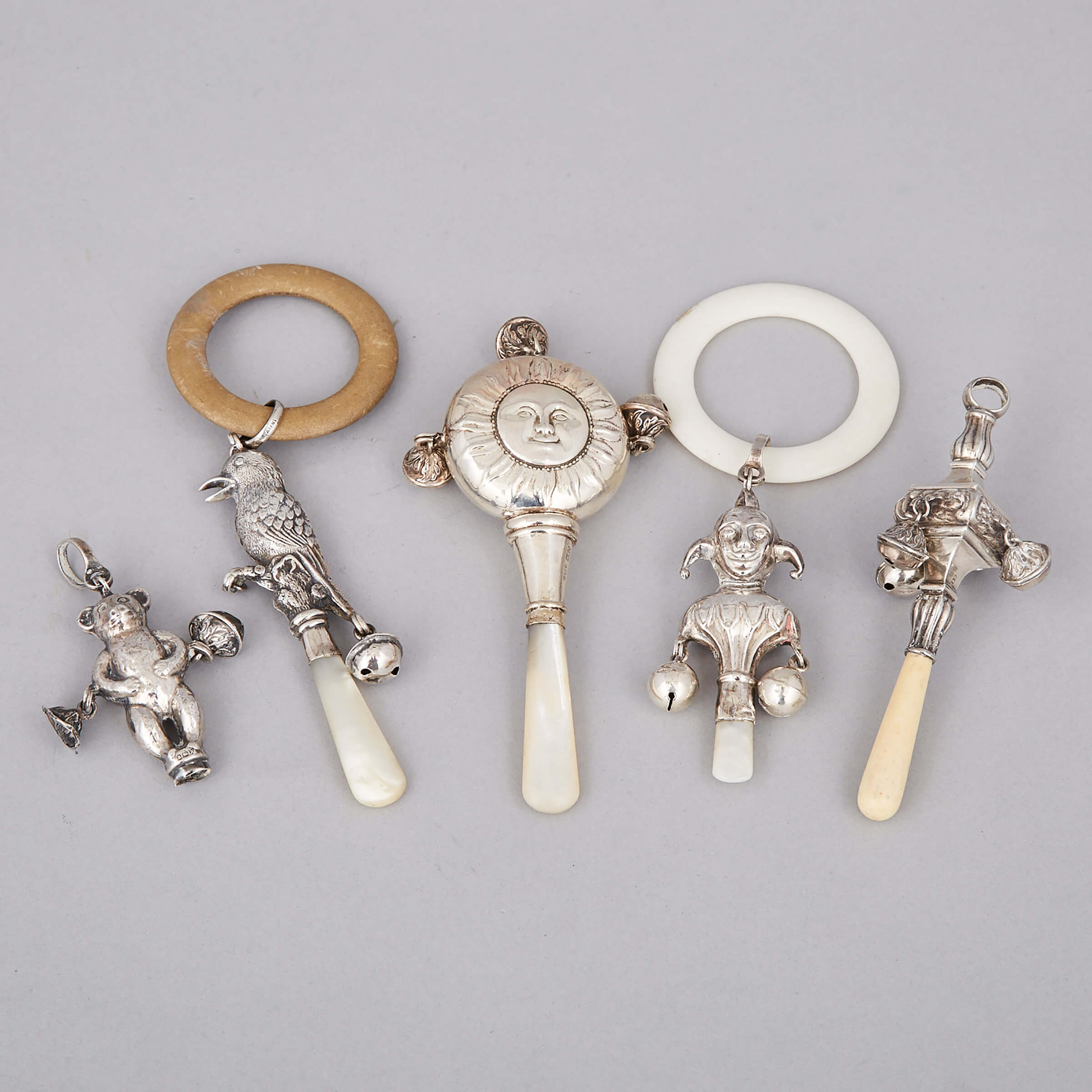 Five English Silver Child’s Rattles and Whistles,Crisford & Norris, Birmingham, 20th century