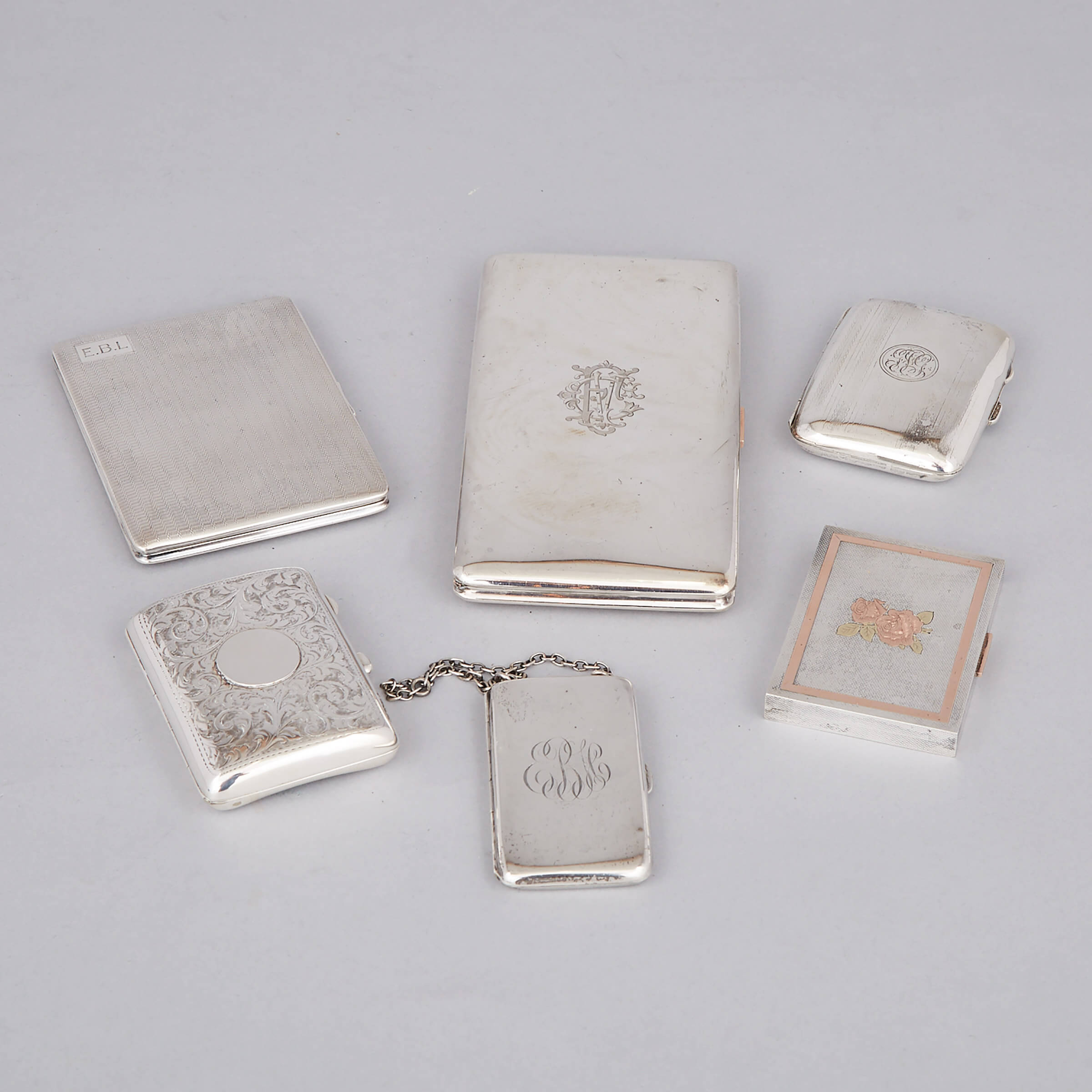 Six English Silver Cigarette Cases, c.1909-49