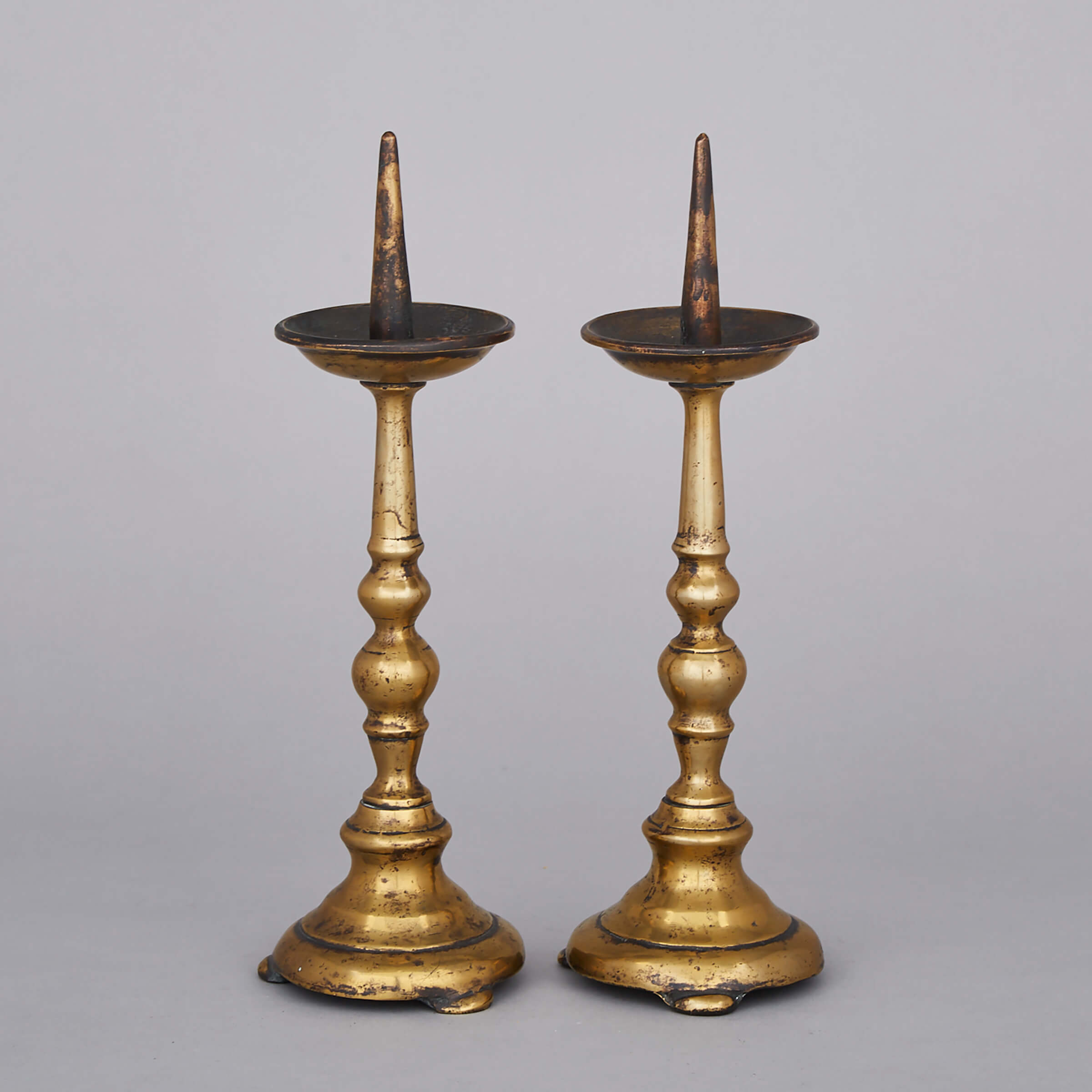 Pair of Continental Brass Pricket Candlesticks, 17th century
