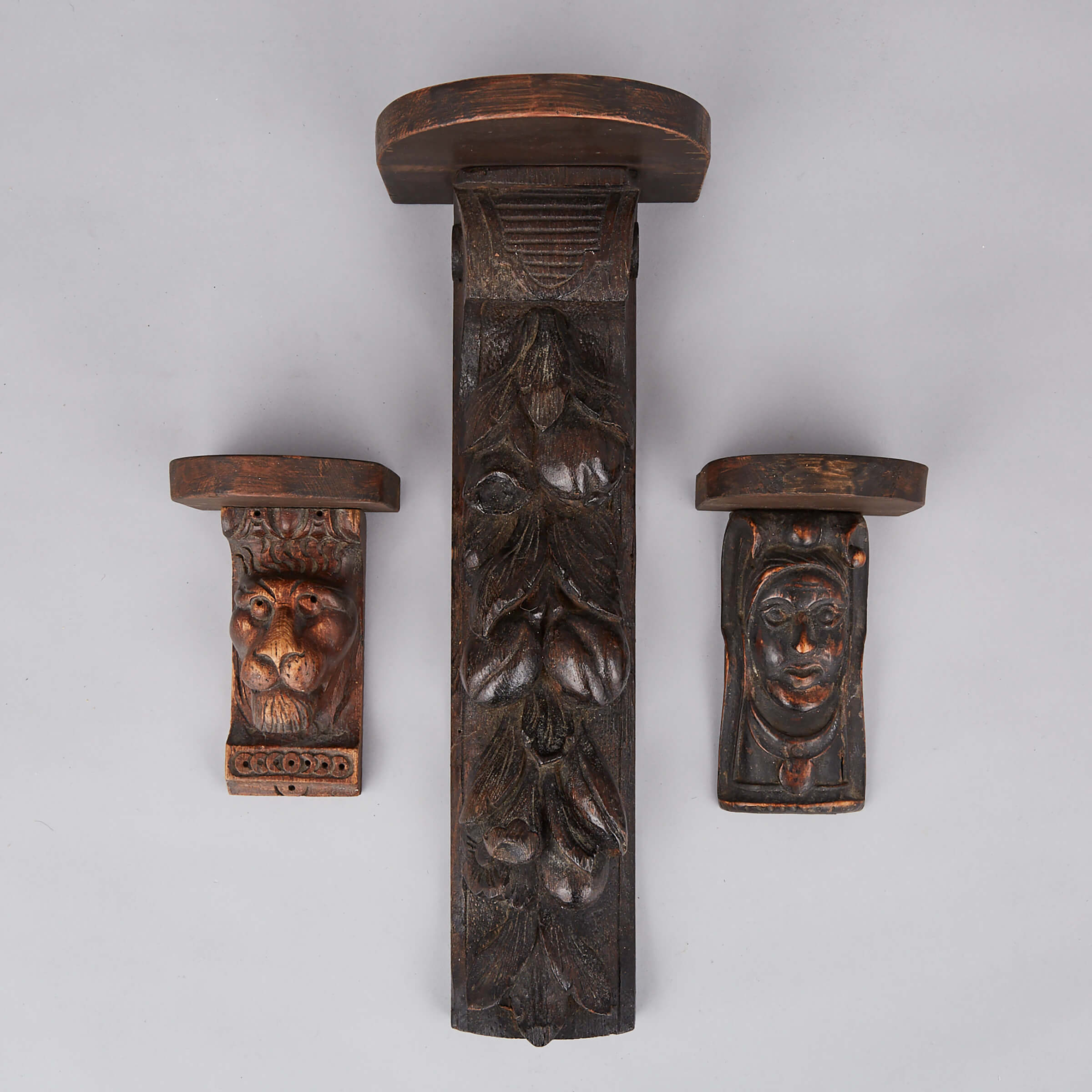 Three English Carved Oak Corbels, 17th century