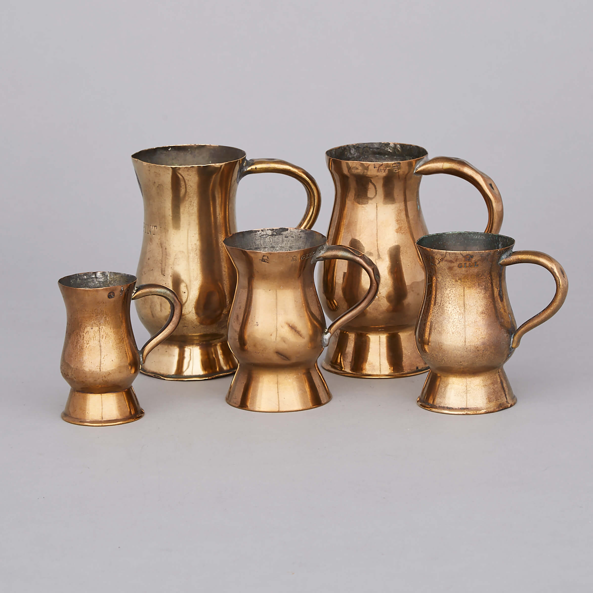 Six Scottish Brass Baluster Measures, mid 19th century