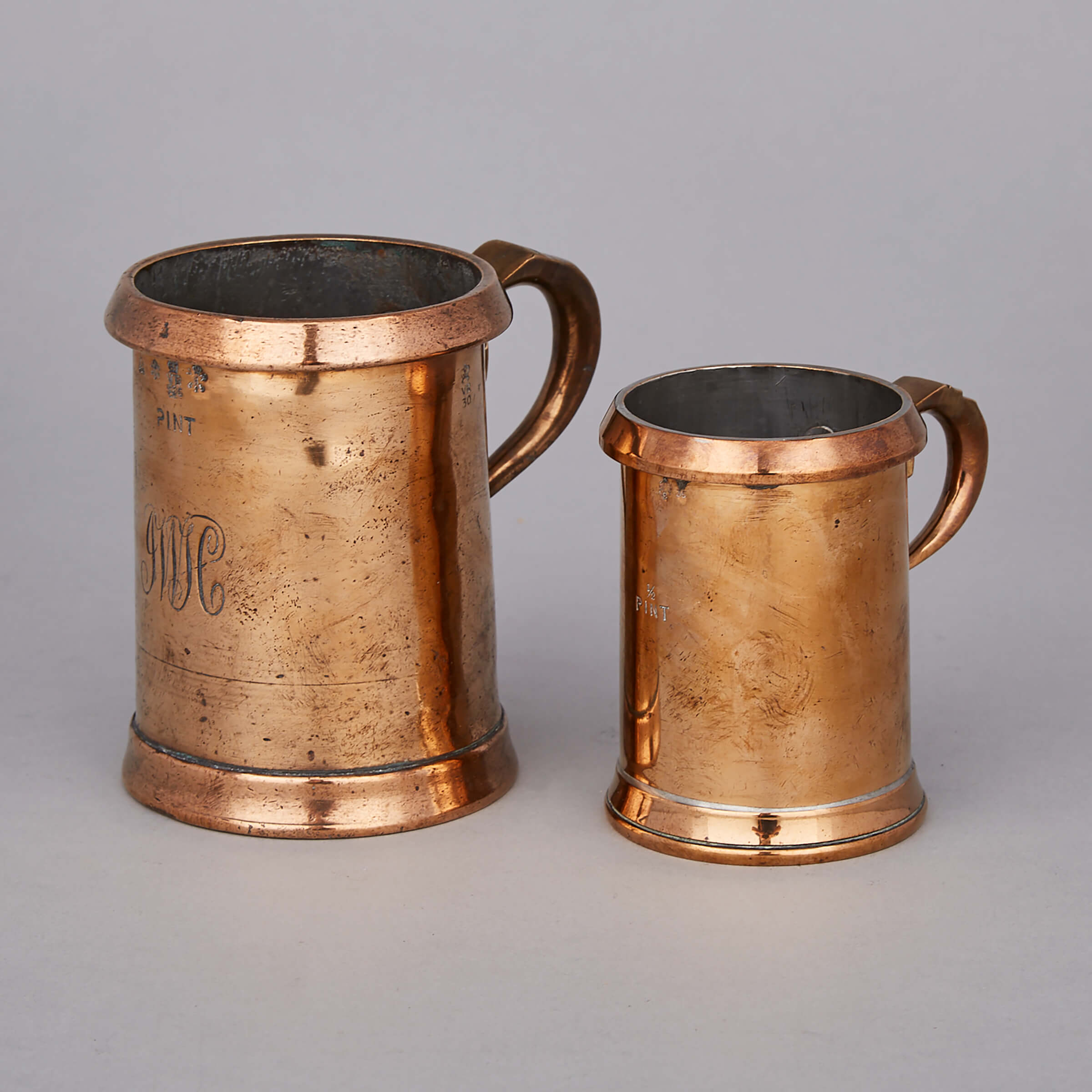 Two English Brass Standard Heavy Rim Measures, 19th/early 20th centuries