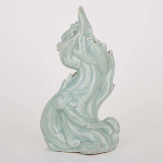 A Rare and Finely Moulded Celadon Glazed Porcelain Dragon, 19th Century