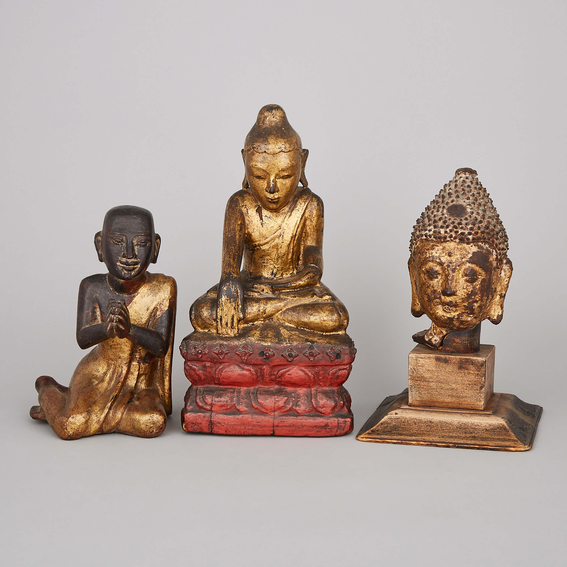 A Group of Three Gilt Southeast Asian Buddhist Figures
