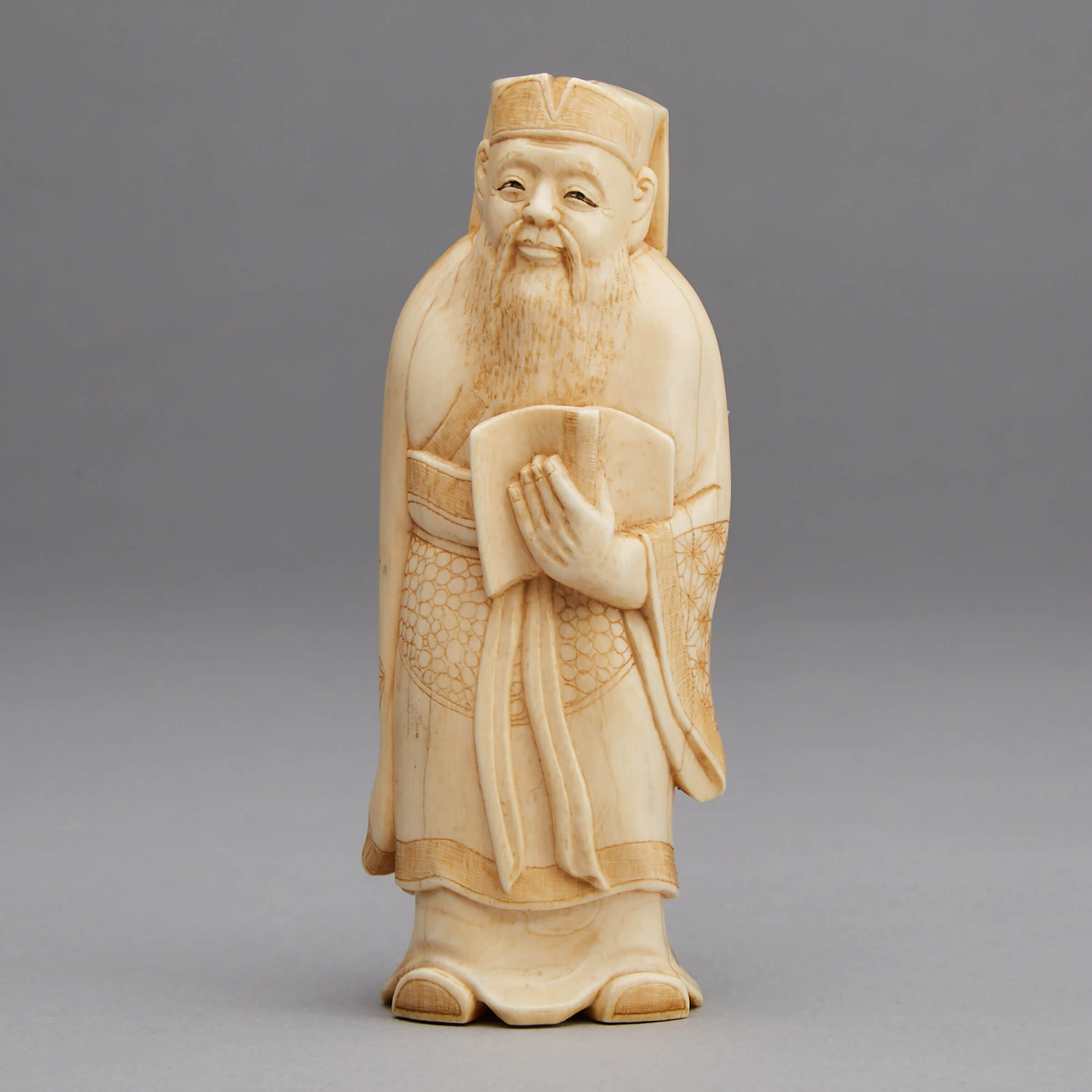 An Ivory Carving of a Scholar 