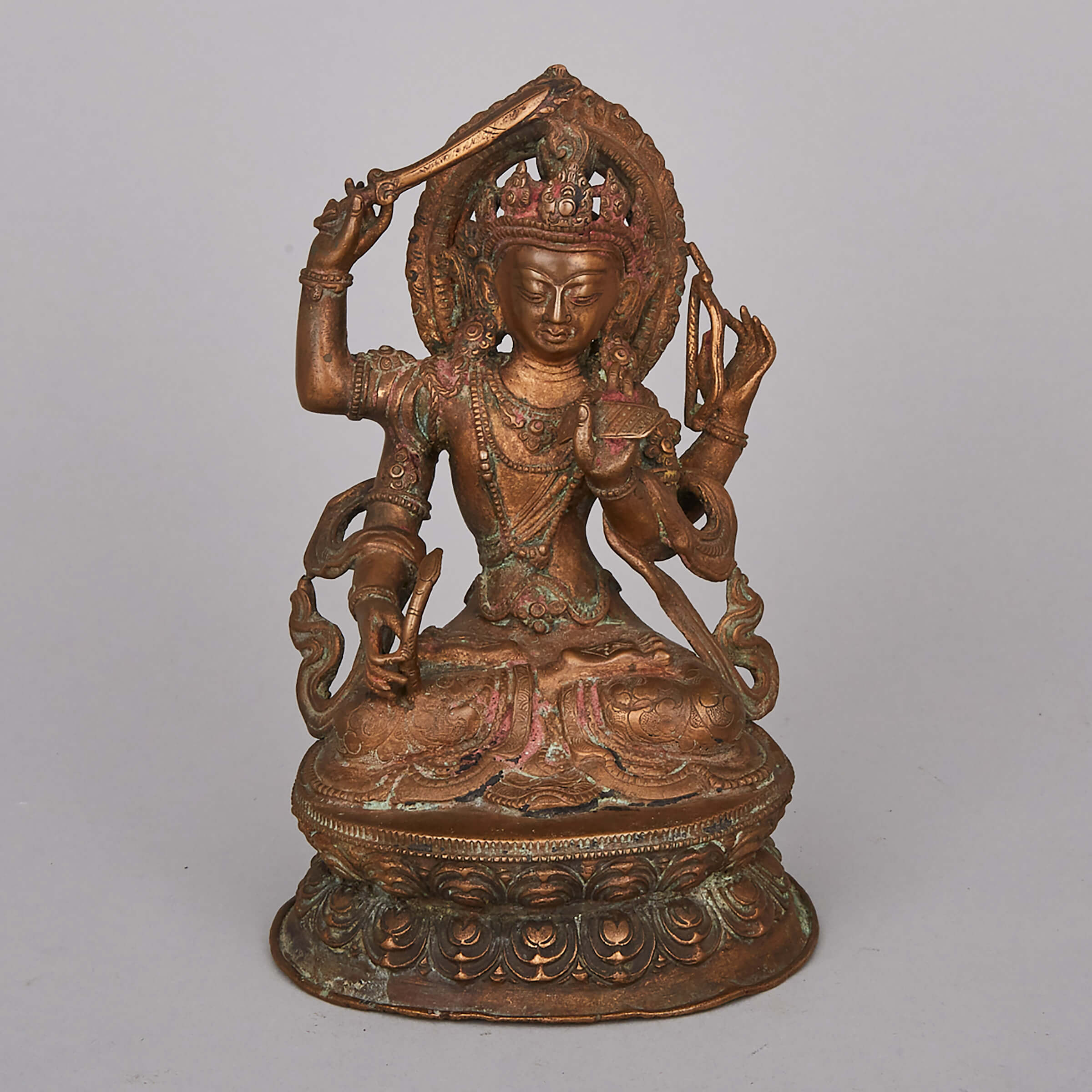 A Gilt Bronze Figure of Manjusri Namasamgiti, Nepal, Circa 1800