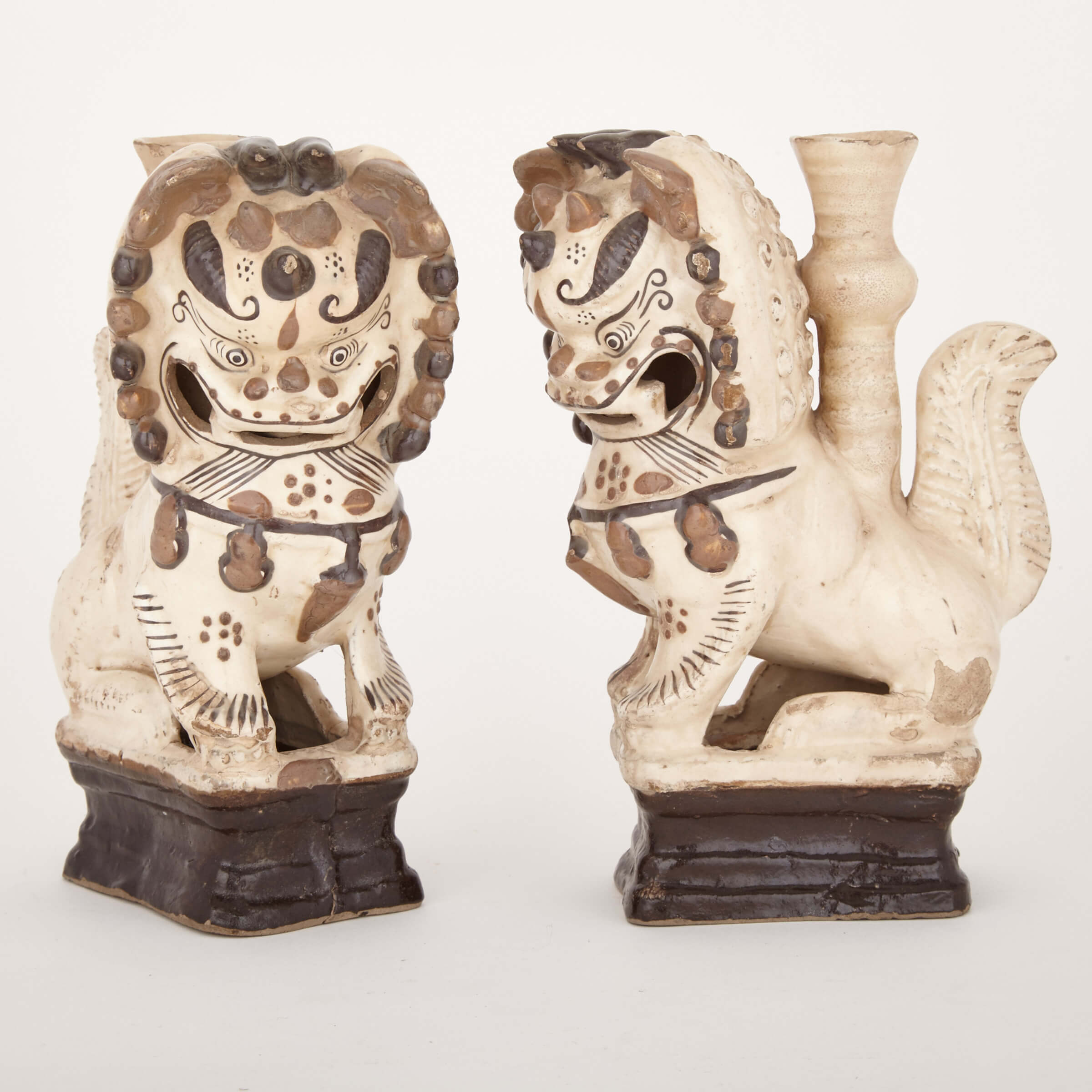 A Pair of Chinese Cizhou Buddhistic Lion Tapersticks, Early 19th Century