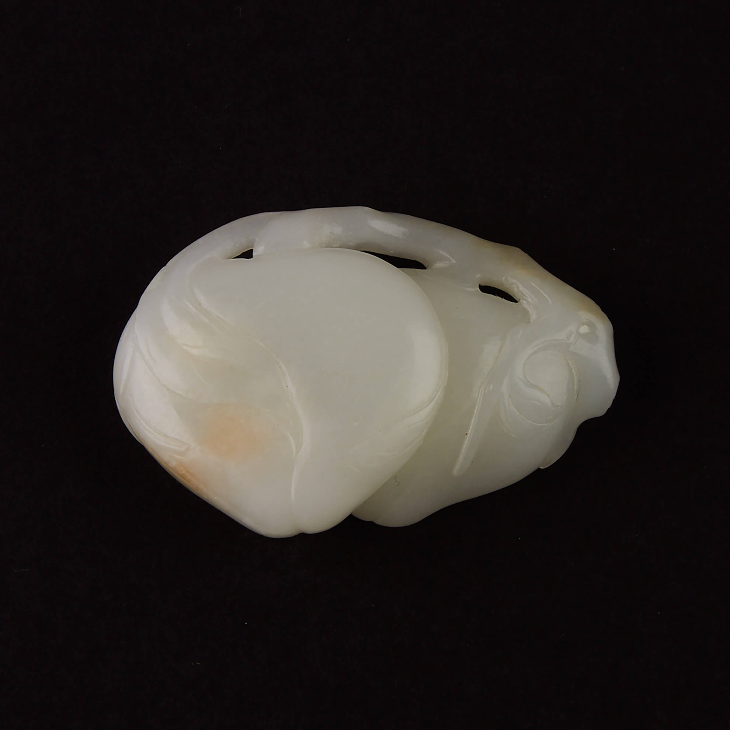 A White Jade Carving of Peaches