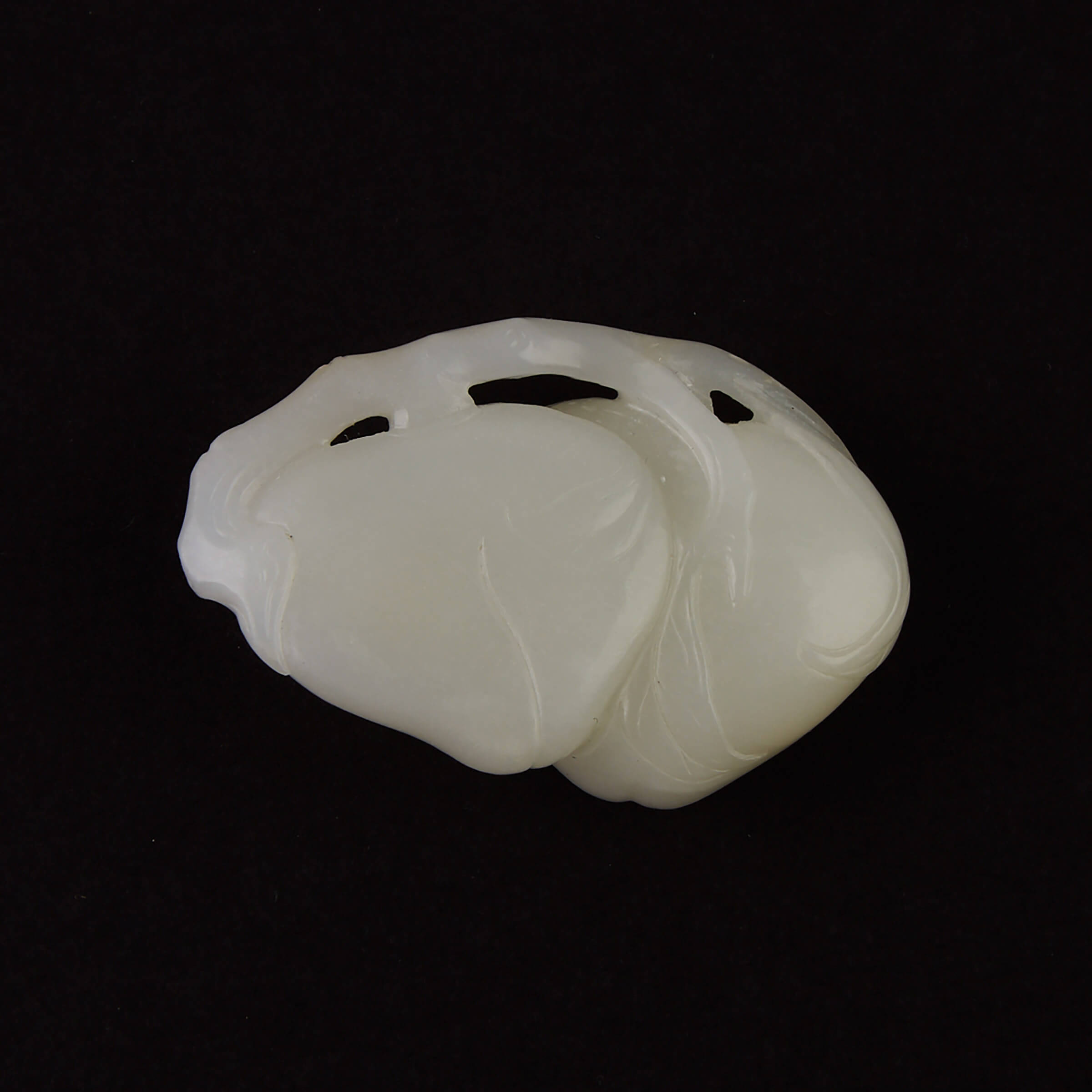 A White Jade Carving of Peaches