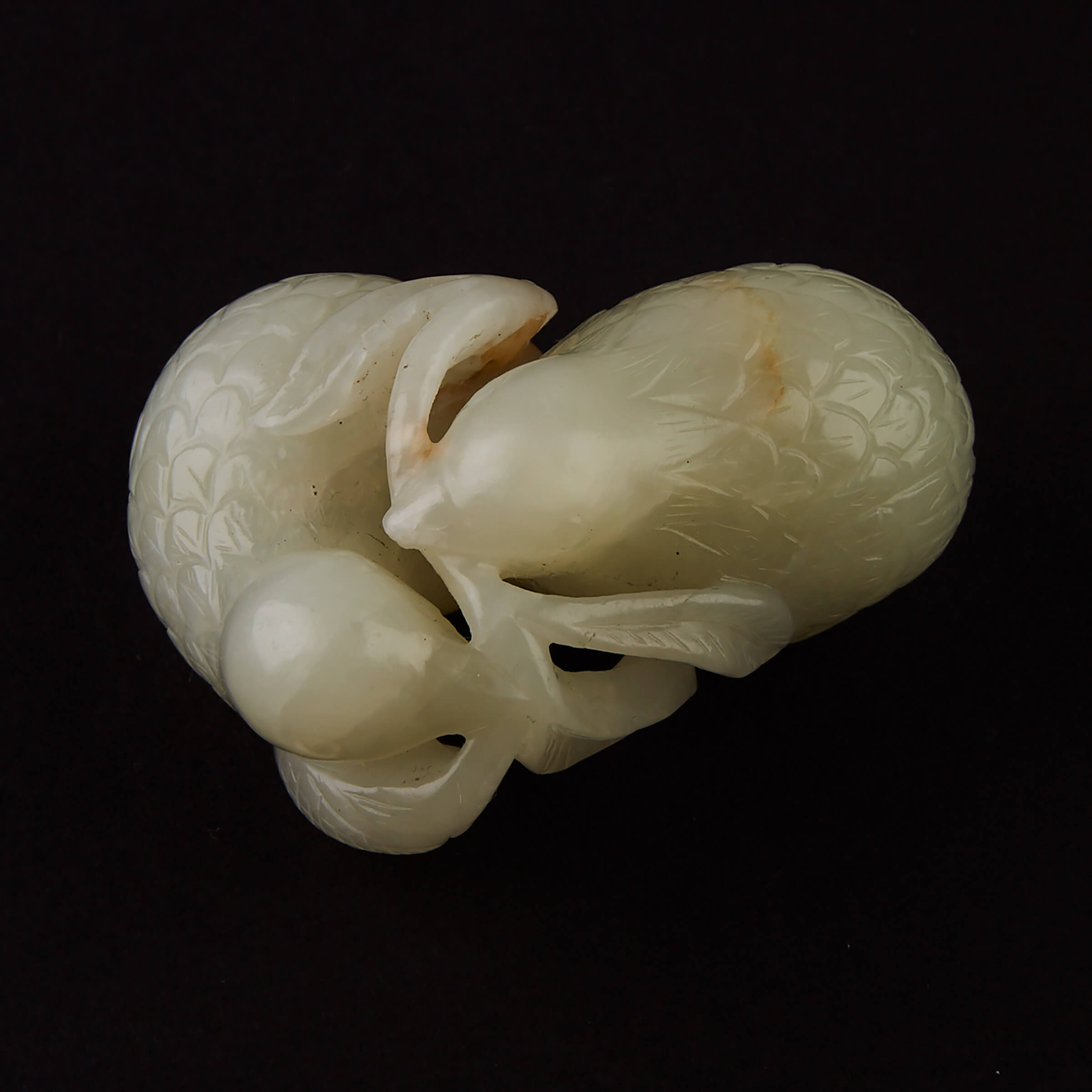 A Celadon White Jade Carving of Two Birds