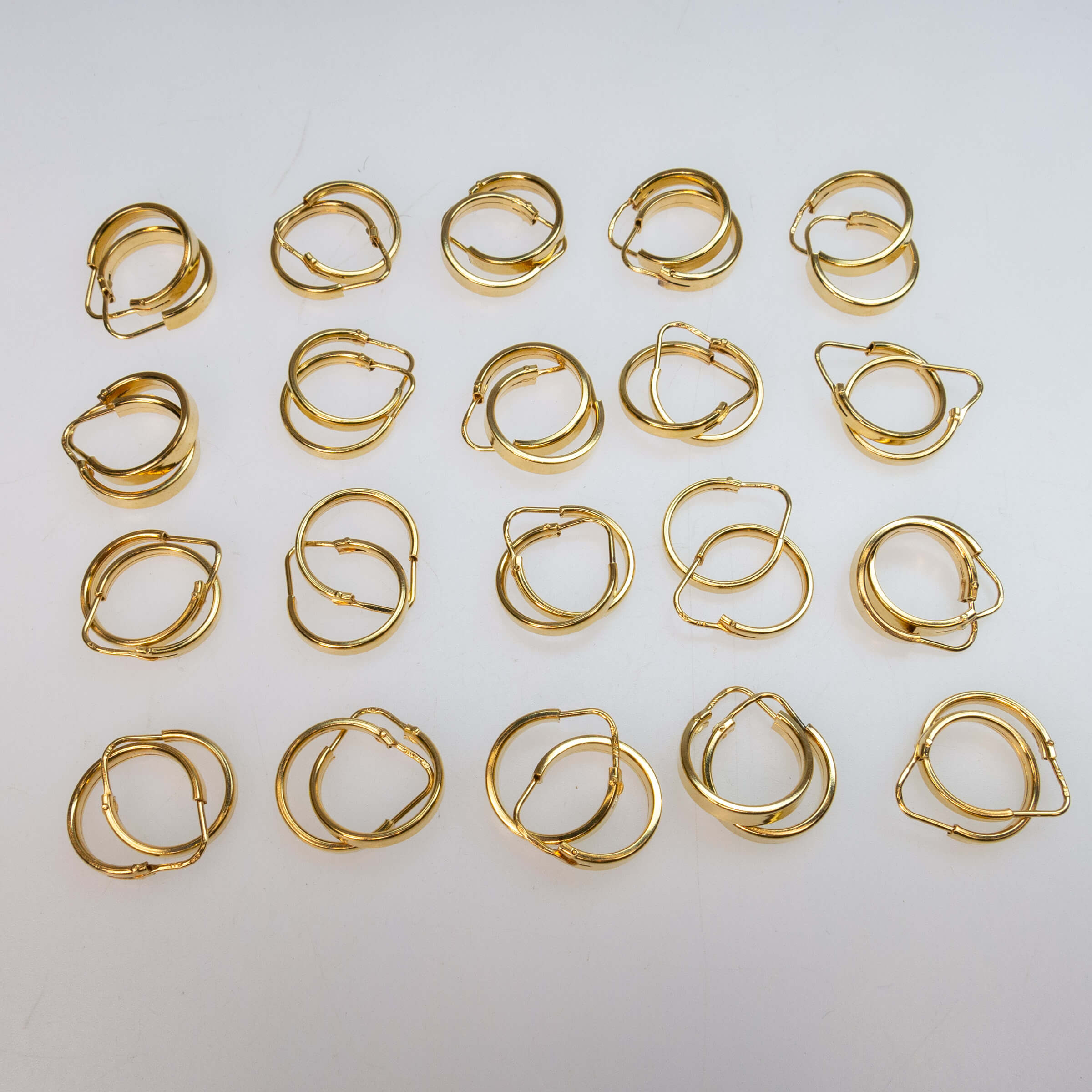 20 Pairs Of 18k Yellow Gold Hoop Earrings