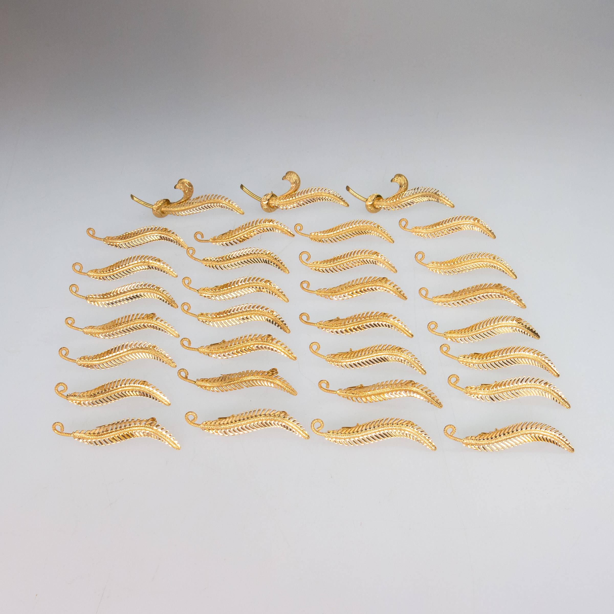31 x 18k Yellow Gold Feather Pins