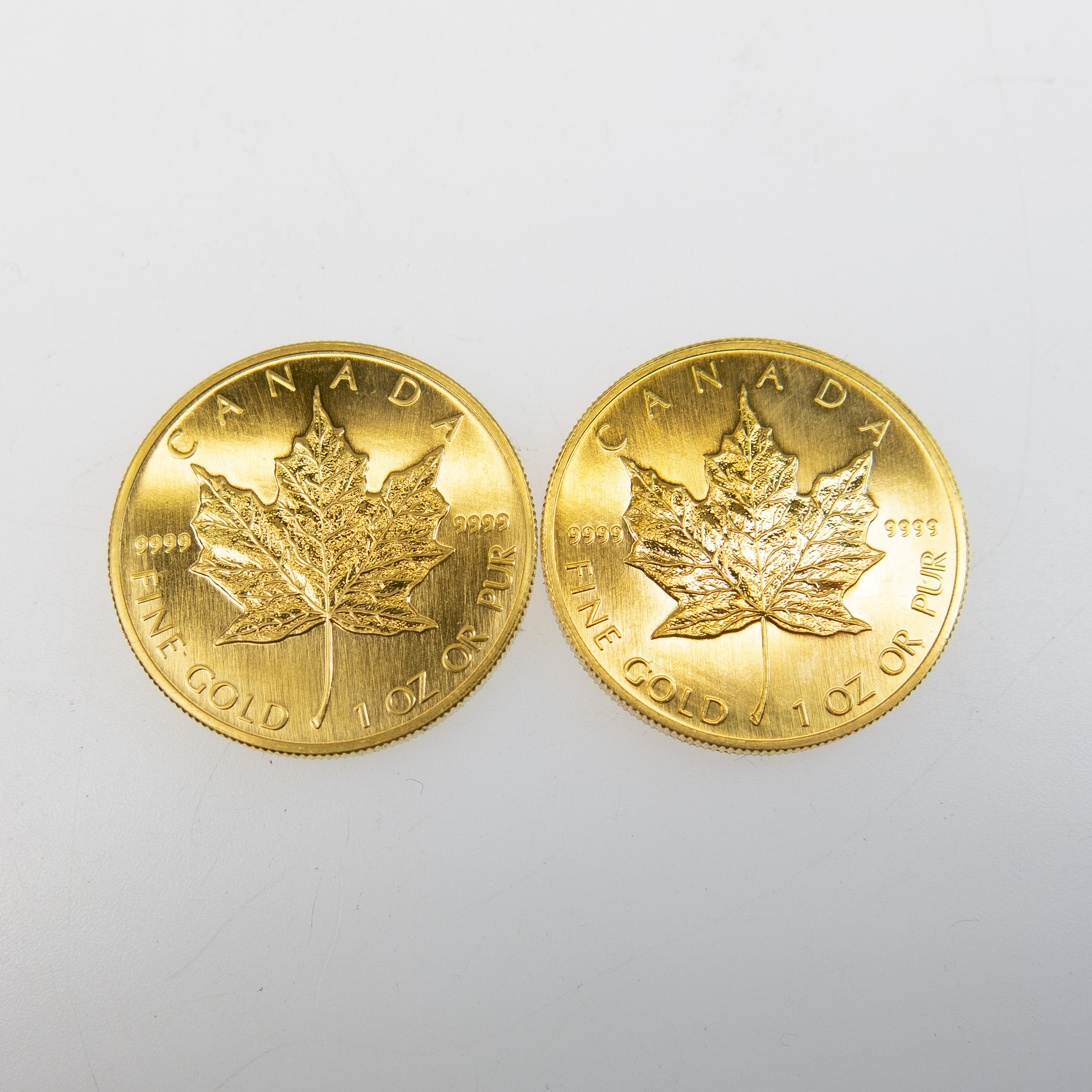 Two Canadian One Ounce Gold Maple Leaf Coins