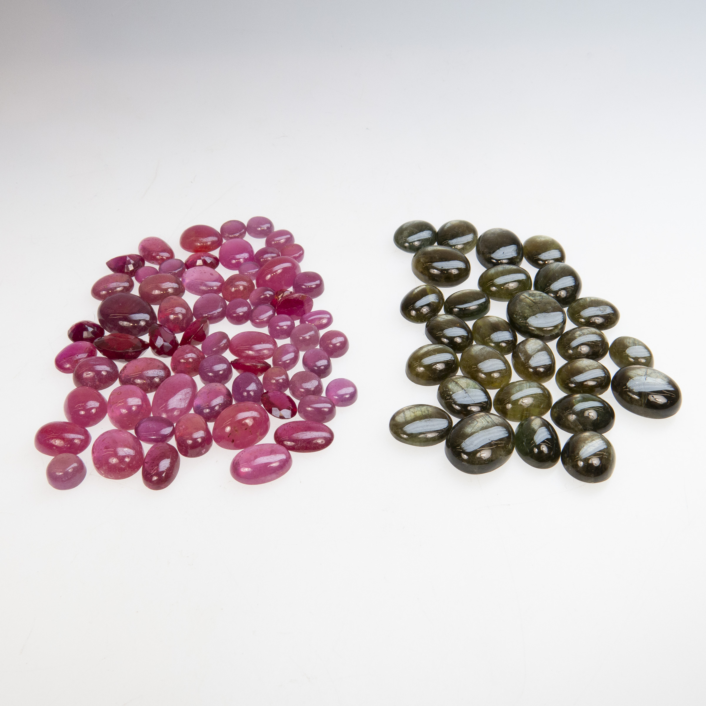Quantity Of Unmounted Black Sapphire Cabochons And Glass-Filled Rubies