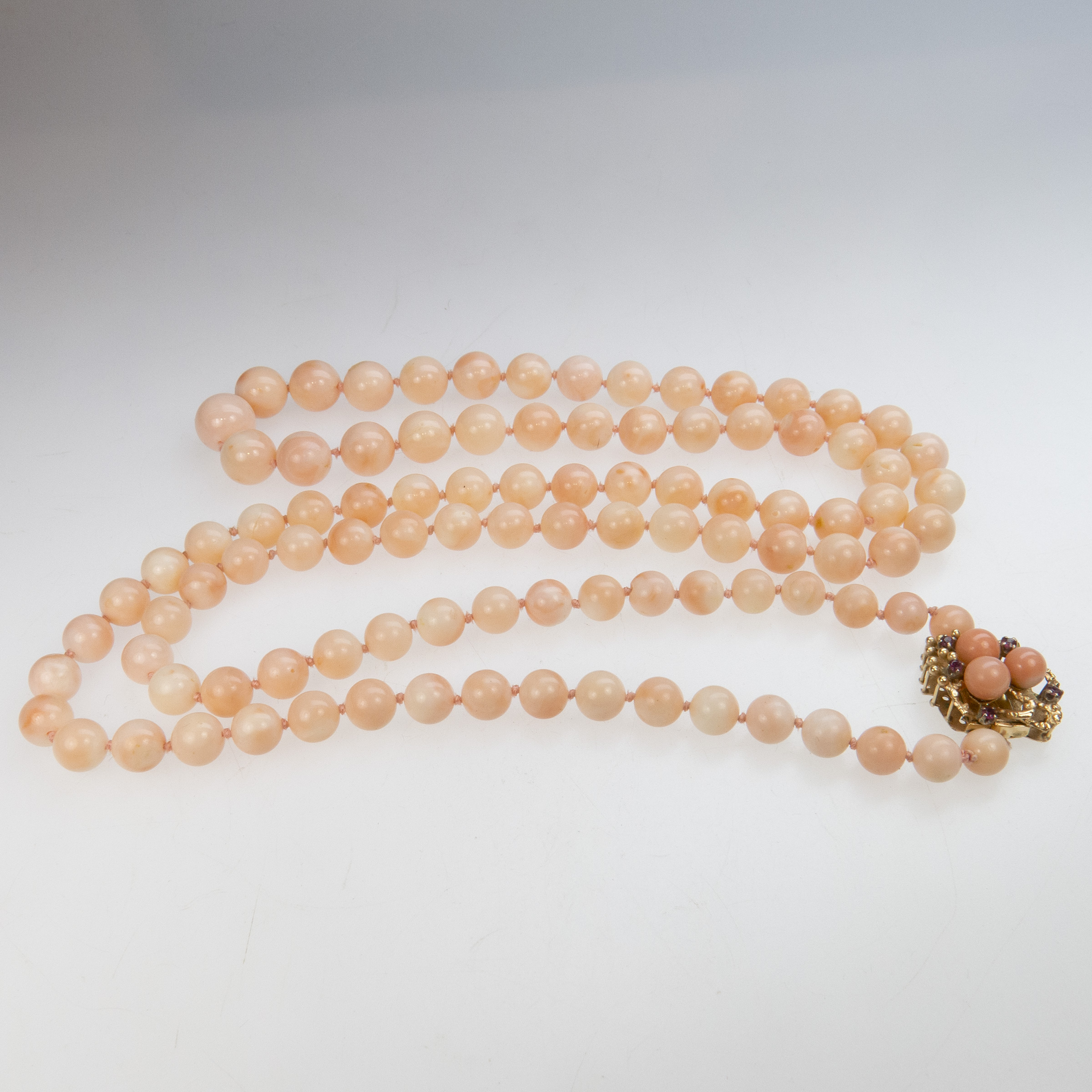 Single Graduated Strand Of Coral Beads